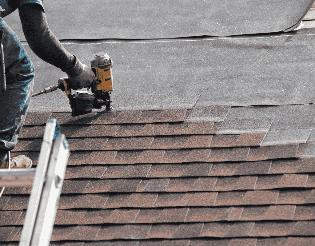 Residential roof replacement in progress on Central Florida property by A.M. Roofing & Construction Inc.